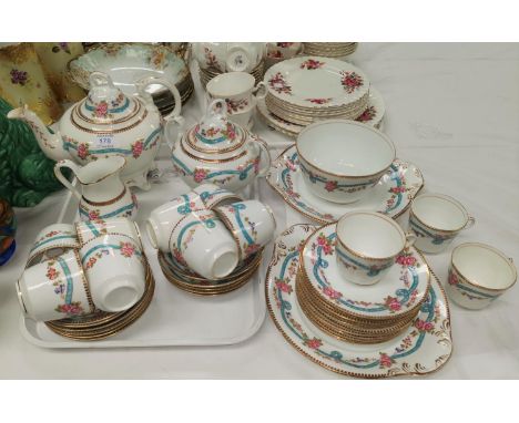 A 19th century Rockingham style tea service with gilt and polychrome decorayion 