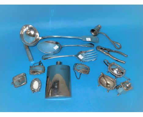 Two  hallmarked silver bottle labels;  a hallmarked silver vesta case; a silver plated soup ladle; cruet and cutlery; hip fla