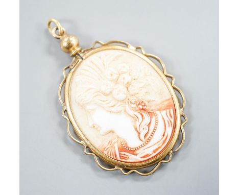 A gilt metal mounted oval ceramic? cameo pendant, 35mm.