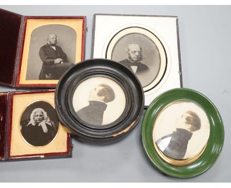 A collection of Victorian photographs etc including a tinted daguerreotype, three portrait miniatures and cabinet cards