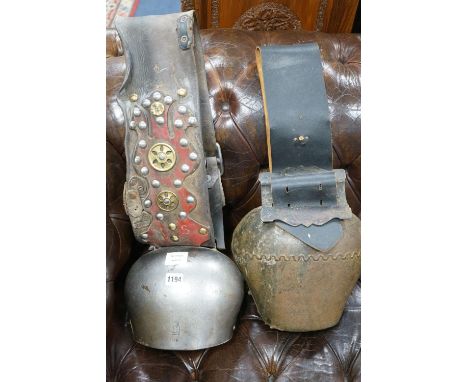 Two large French or Swiss vintage cow bells, larger 26cm, height 22cm