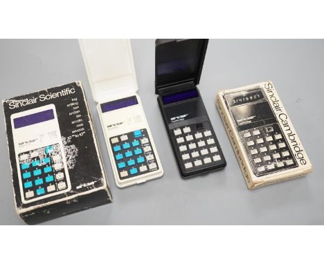 Two vintage Sinclair calculators, boxed