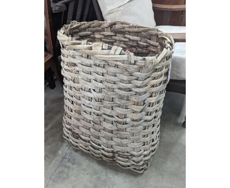A vintage woven grape hod, width 48cm, height 64cm
