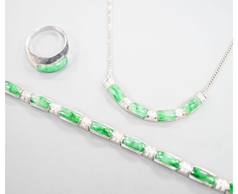 A modern white metal (stamped 850), jade and diamond cluster set bracelet, approx. 15.5cm, with a matching ring, size O and n