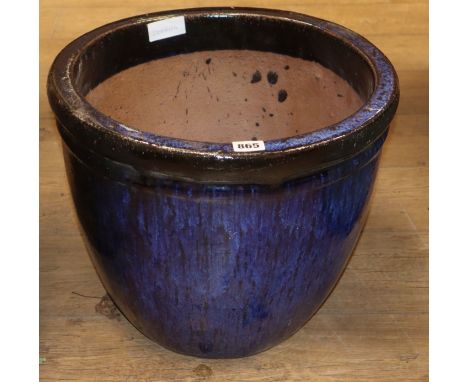 A blue glazed earthenware garden planter H.34cm