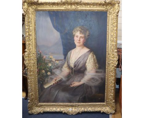 Maud Hall Neale (c. 1869-1960), three-quarter length portrait of Mrs Green-Wilkins seated beside a window, signed, oil on can