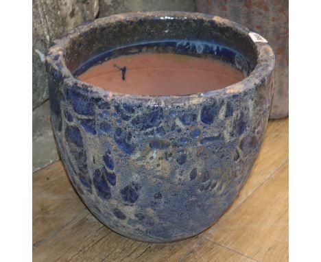 An 'Atlantis' blue glazed garden planter H.29cm