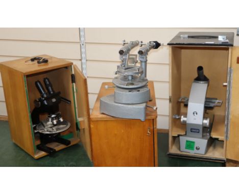A Comparison microscope unit, no.128, cased, a Spencer Buffalo USA microscope microscope, no.148608, cased and a Griffin &amp