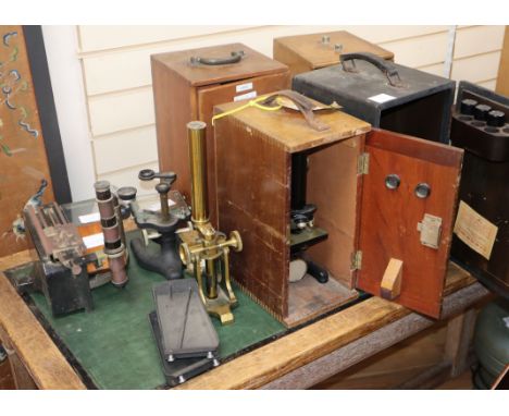 An E. Leitz Wetzlar microscope, no.14003, cased, a Prior microscope, no. 14003, cased, a Spencer microscope, no. 186603, case