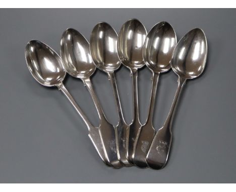 A matched set of six 19th century silver fiddle pattern dessert spoons including one by Paul Storr, London, 1818, 8.5 oz.