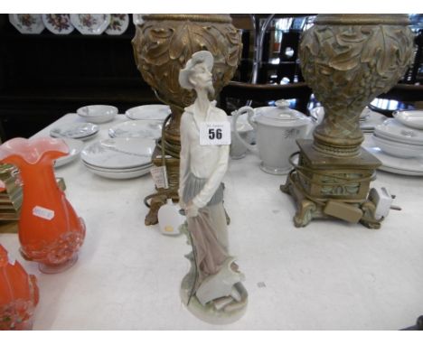 A Lladro figure swordsman