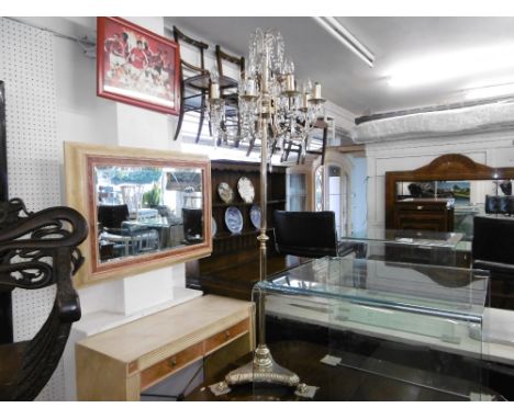 An eight branch brass crystal drop standard lamp