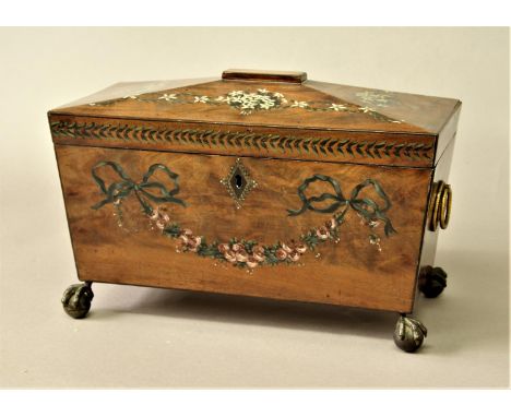 REGENCY MAHOGANY TEA CADDY of sarcophagus form, painted with ribbons and floral swags on ball and claw feet, height 21cm, wid