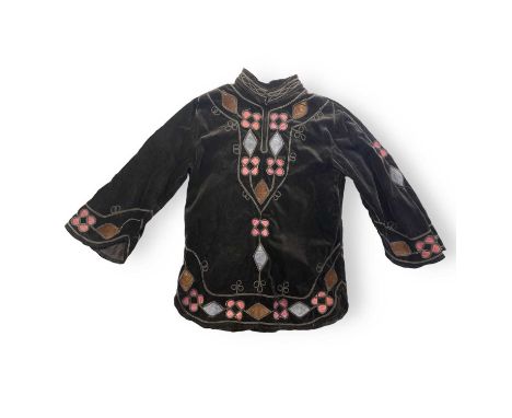 A tailored men's kaftan by 'Designs By Christa Davis' owned by Mark Gardener and worn most notably by him on the photoshoot f
