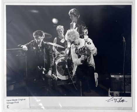 An 8x10" vintage handmade darkroom print of an image taken by photographer Virginia Turbett depicting The Sex Pistols during 