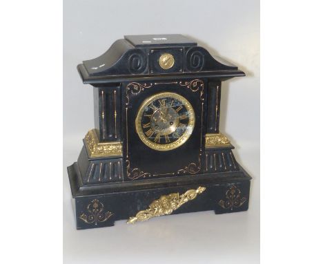 Victorian slate and gilt metal mantel clock with visible escapement
