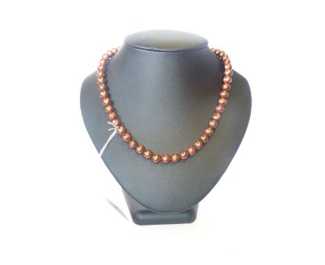 Freshwater pearl necklace, composed of uniform copper coloured pearls, 83cm