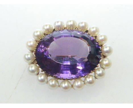 Victorian amethyst and cultured pearl brooch, the yellow metal mount indistinctly stamped, 30mm by 27mm, 12 grams