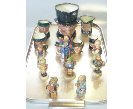 Eight Hummel figures and eight various sized Royal Doulton character jugs