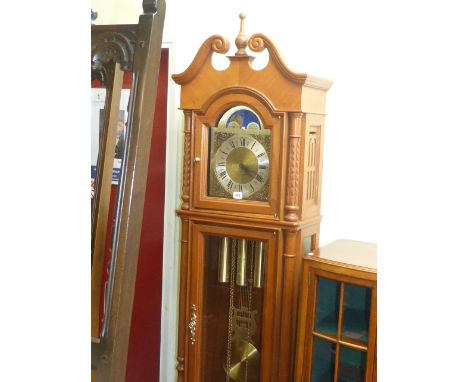 Modern triple weight longcase clock having arched moon phase dial