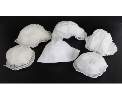 Collection of Late 18th and 19th Century Baby Bonnets, comprising a plain linen cap with attached split tape, another with a 