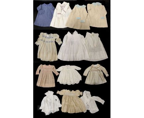 Early 20th Century Baby and Toddler Costume in silk, linen and cotton comprising two similar cream linen dresses with pale bl