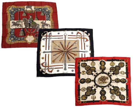 Three Hermés Silk Scarves, comprising Cannes &amp; Pommeaux, designed by F De La Perriere, depicting leather and metal mounte