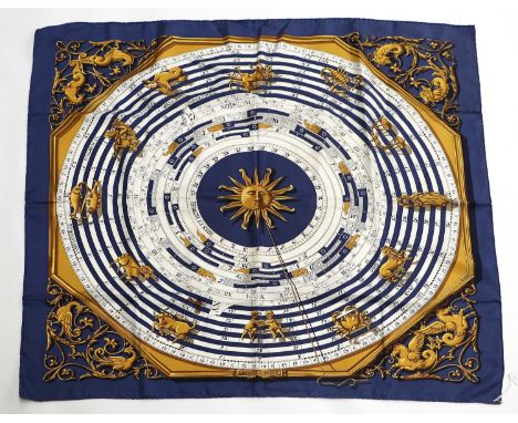 Hermés Silk Scarf Dies et Hore, depicting horology motifs printed in cream, gold and within navy blue border, 90cm square, bo