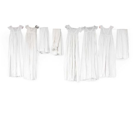 Circa 1810-60s White Baby Gowns comprising a bodice of multi pleated tucks flanked by embroidered insertions which follows fr