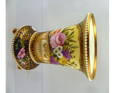 AN EARLY 20TH CENTURY SPODE PORCELAIN VASE having white beaded rim, trumpet flared body, floral vignettes and gilt, raised on