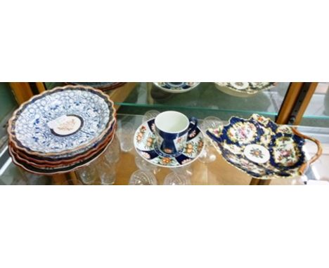 A WORCESTER PORCELAIN DISH having single handle and blue ground with floral vignettes, a cup and four various plates
&nbsp;