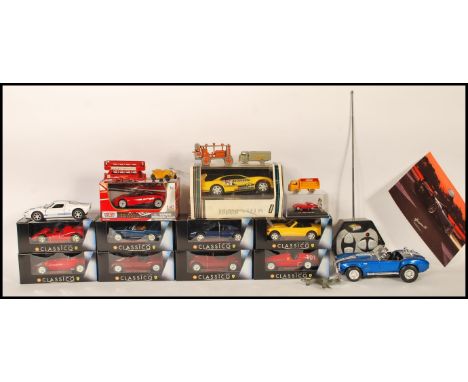 A collection of assorted vintage and contemporary diecast models. To include; some loose vintage Matchbox Lesney models, boxe