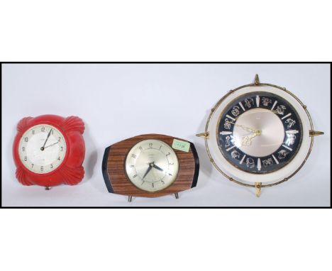 A group of three 20th Century retro clocks by Metamec, two being wall clocks with one having&nbsp;zodiac characters, the othe