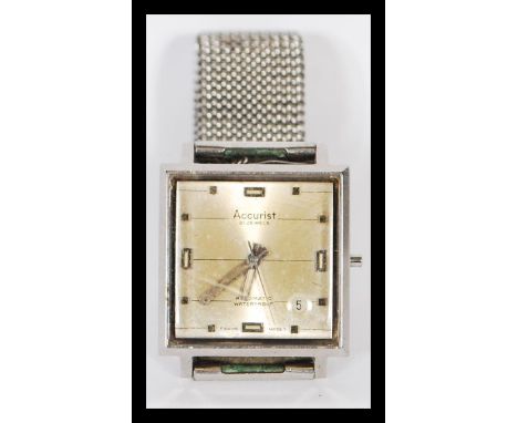 A vintage mid century gents Accurist square faced wristwatch. The champagne dial marked Accurist 21 Jewels - Antimagnetic / W