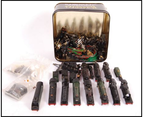 A collection of assorted N Gauge model railway train set locomotive spares and repairs to include 10x Grafar bodies, wheels, 