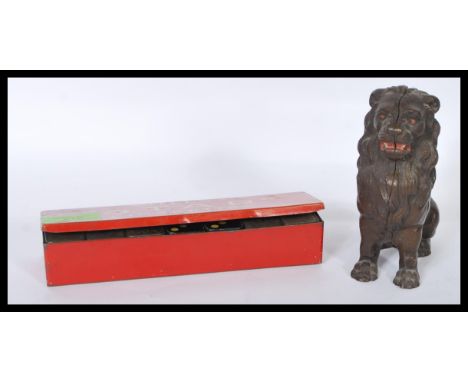 A vintage Will's ' Star ' cigarettes advertising promotional cased set of tin dominoes together with a vintage cast metal mon