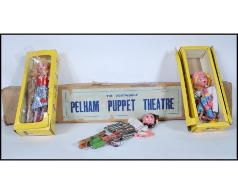 A collection of three vintage 20th Century Pelham puppets to include Gypsy, Dutch Girl both with boxes and another together w