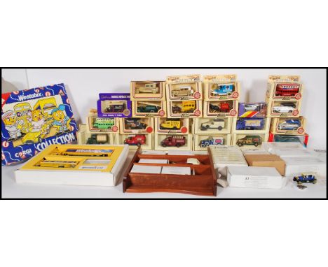 A collection of assorted boxed diecast model cars and vehicles. To include Days Gone by Lledo mostly advertising related, Mat