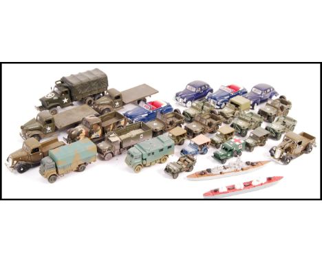 A collection of assorted scale diecast model military vehicles mostly consisting of Willy Jeep with some Corgi and others.