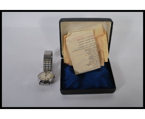 A mid century, circa 1960's vintage gentlemans wristwatch by Accurist having a champagne dial with good facet hands marked Sw