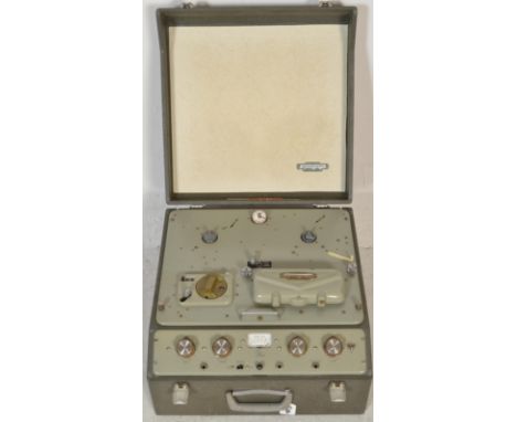 A vintage 20th Century Ferrograph type 5A serial no 5/30170 reel to reel tape recorder, vinyl cover to the case, hinged lift 