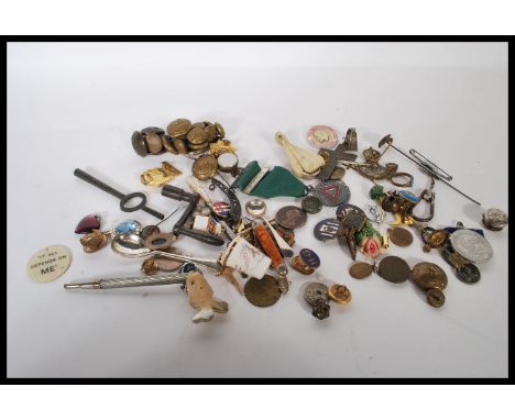 A collection of vintage 20th Century collectible jewellery items to include mixed enamelled cap badges to include national sa