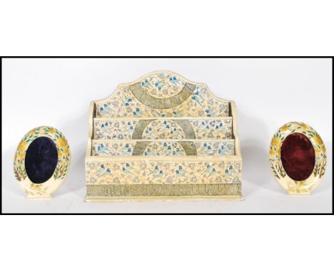 A vintage 20th Century hand painted desk tidy letter organiser being hand painted with Persian Islamic decoration of birds an