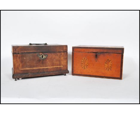 An 18th century satinwood tea caddy of smaller form with inlaid cartouche panel top with sunburst ovals to the front and span