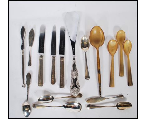 A collection of silver hallmarked flatware to include George Howson for Harrods knives, , silver handled knife, silver handle