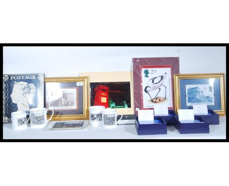 A collection of Royal Mail related items to include four boxed official Royal Mail art glass paperweights on stands, a Penny 