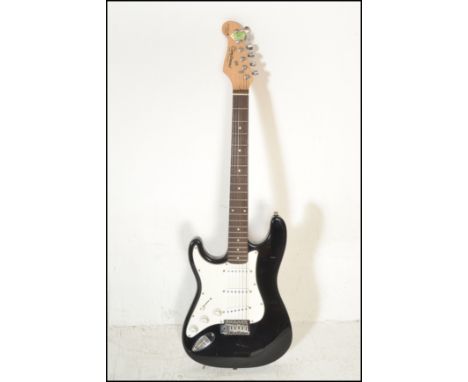 A six string electric guitar by&nbsp;Tanglewood Nevada model no. FST32K. The guitar of typical form finished in black having 
