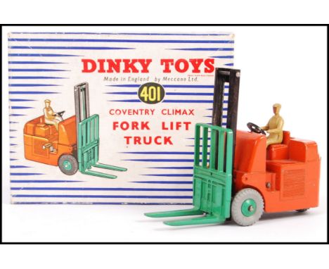 An original vintage Meccano Dinky Toys made boxed diecast model 401 Coventry Climax Fork Lift Truck appearing complete in ori