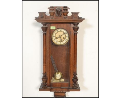VIENNA REGULATOR WALL CLOCK, two train eight day movement, the round enamel dial with Roman numerals, contained in an archite