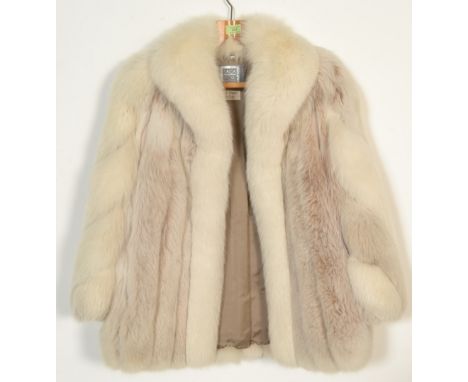 A vintage 20th Century ladies white fox fur short jacket, silk lining with makers label for F. K. Bauers and Sons Bristol, ap